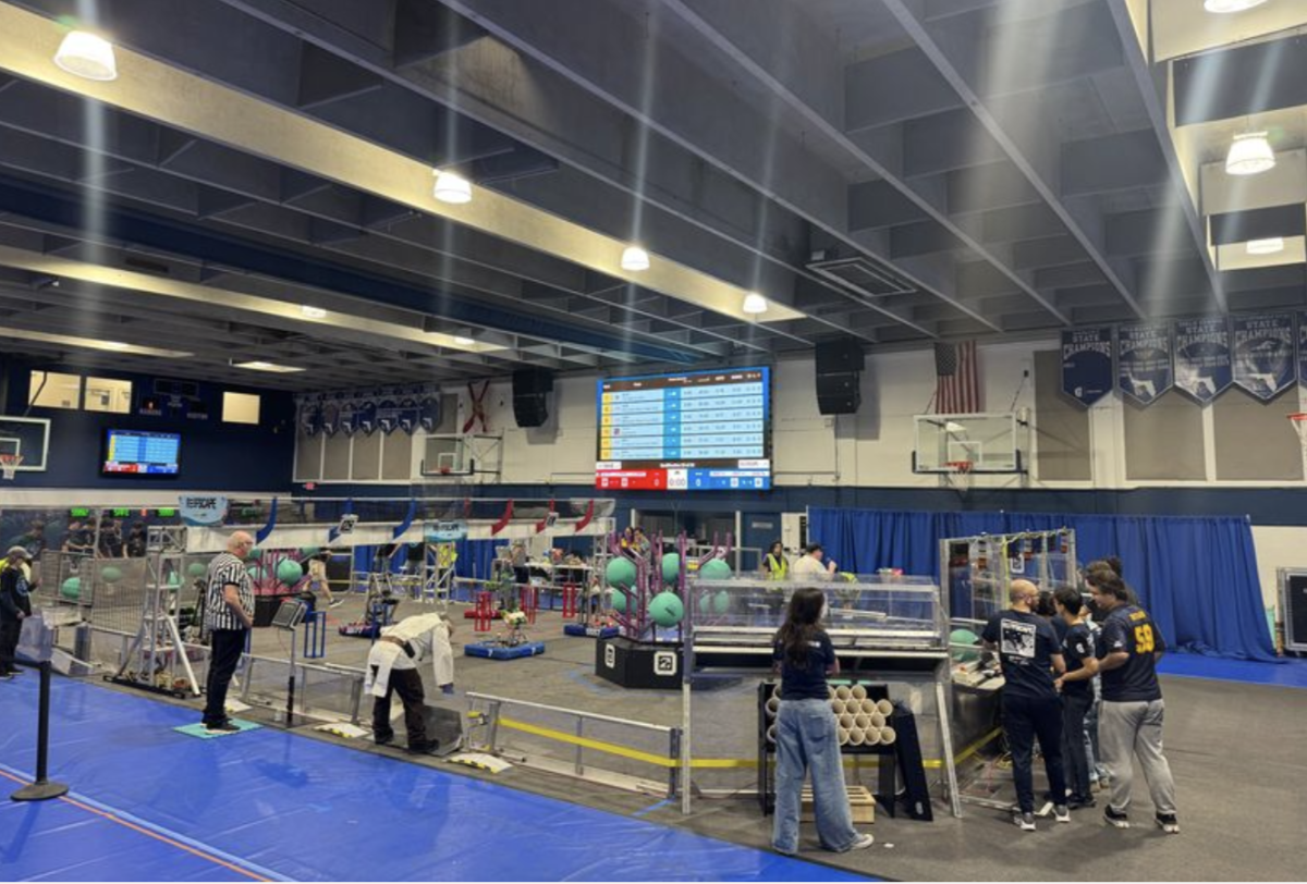 Students from all programs set up before the start of the competition. The Blue Dudgeon was transformed from a historical gym to a place of STEM innovation.   