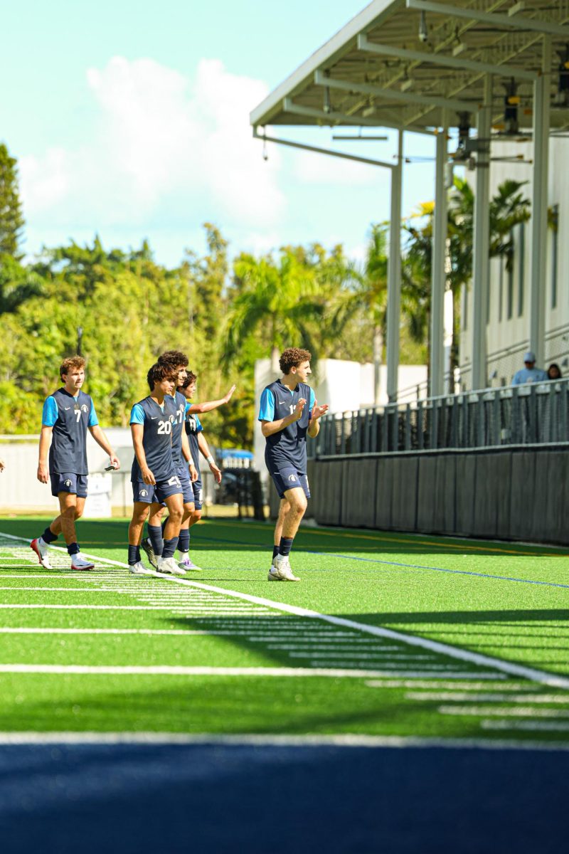 Senior forward Gonzalo Senior leads his teammates off the field after the game. Senior has started the season off on fire having eight points (goals + assists) in five games according to MaxPreps.