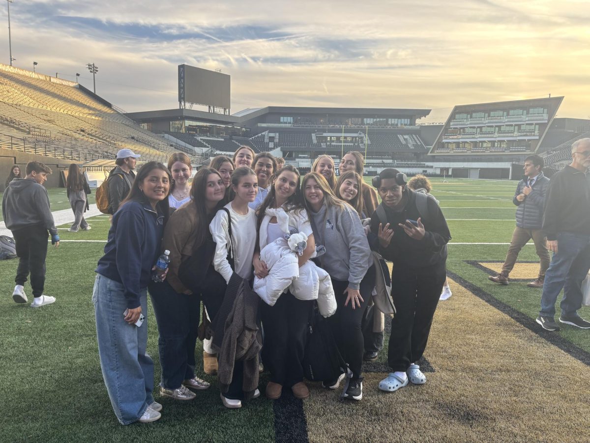 Students pose at FirstBank Stadium, Vanderbilt’s Football Field. This was a part of the athletic and media facility, where the young journalists saw a glimpse of what to strive for.