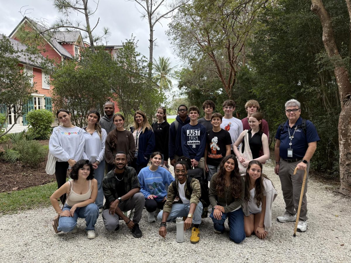 Students and staff of "The Raider Voice" gather at the Deering Estate on Dec. 15 during a hands-on documentary filmmaking workshop. Guided by Deering McCormick Fellow and filmmaker Marlon Johnson, students explored the estate’s historical and environmental significance while learning the fundamentals of visual storytelling. The experience allowed students to collaborate in production teams and gain firsthand experience in multimedia journalism.