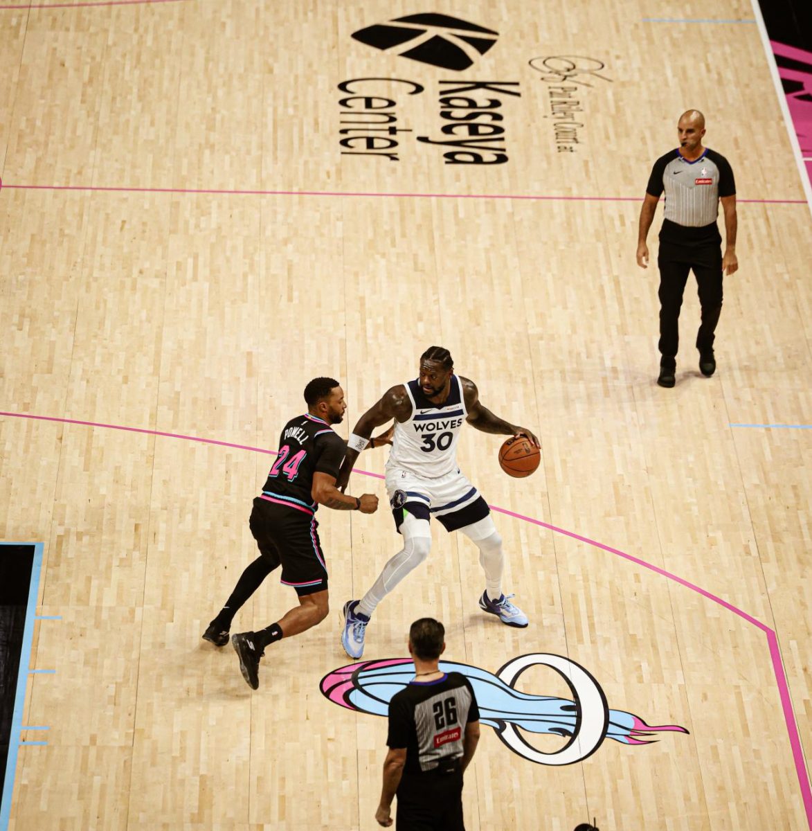 Minnesota Timberwolves Power Forward Julius Randle backs down a miami heat player. Randle has improved as a playmaker this season leading the team with 5.7 assists per game.