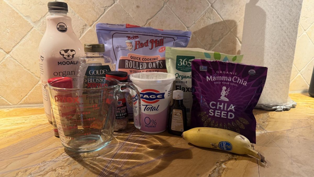The ingredients for overnight oats are laid out before preparation begins. The simple, customizable is convenient, tasty and keeps you full for hours.