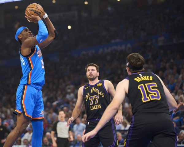 OKLAHOMA CITY, OKLAHOMA - APRIL 02: Shai Gilgeous-Alexander #2 of the Oklahoma City Thunder drives to the basket during the first half against the Los Angeles Lakers at the Paycom Center on April 2, 2026 in Oklahoma City, Oklahoma. NOTE TO USER: User expressly acknowledges and agrees that, by downloading and or using this photograph, User is consenting to the terms and conditions of the Getty Images License Agreement. (Photo by Cooper Neill/Getty Images)